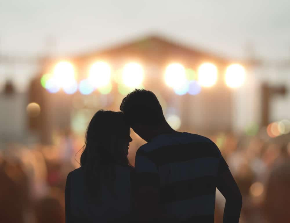 sweet couple attending live show music