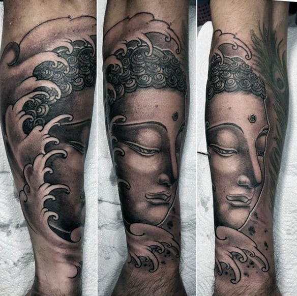 Swirls And Calm Buddha Face Tattoo On Legs For Men