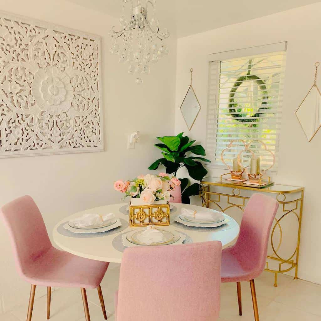 white dining table pink chairs and gold table 