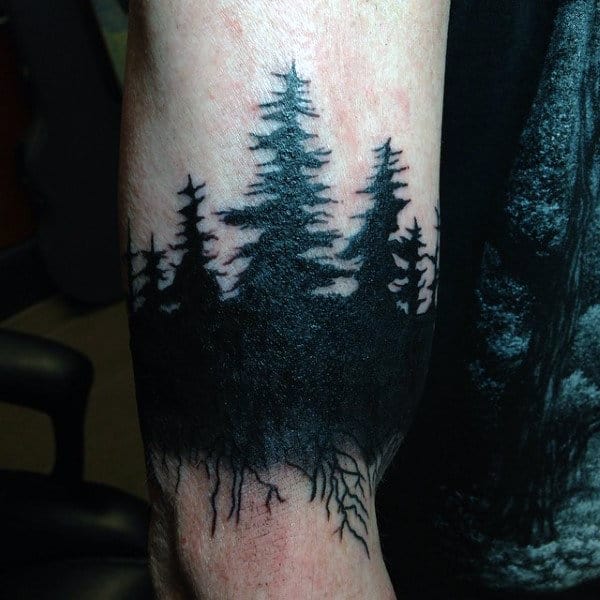 Tattoo Of Pine Tree Forest On Man