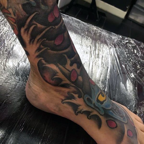 Tattoo Wave On Man Leg And Foot
