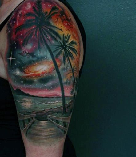 Tattoos Of The Ocean And Beach On Guys Arm