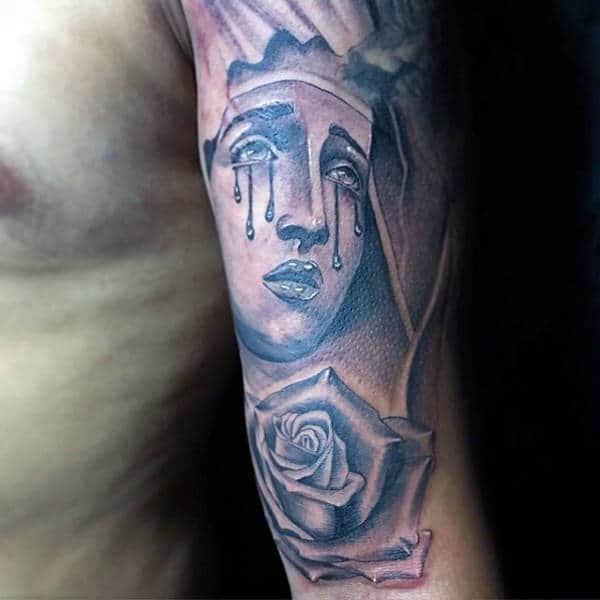 Tearful Christian Male Virgin Mary Tattoo On Arms
