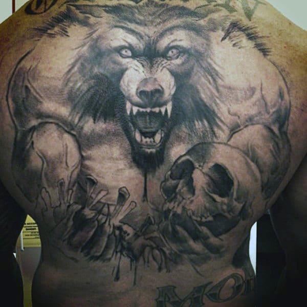 Terrific Werewolf And Skull Tattoo On Mans Back