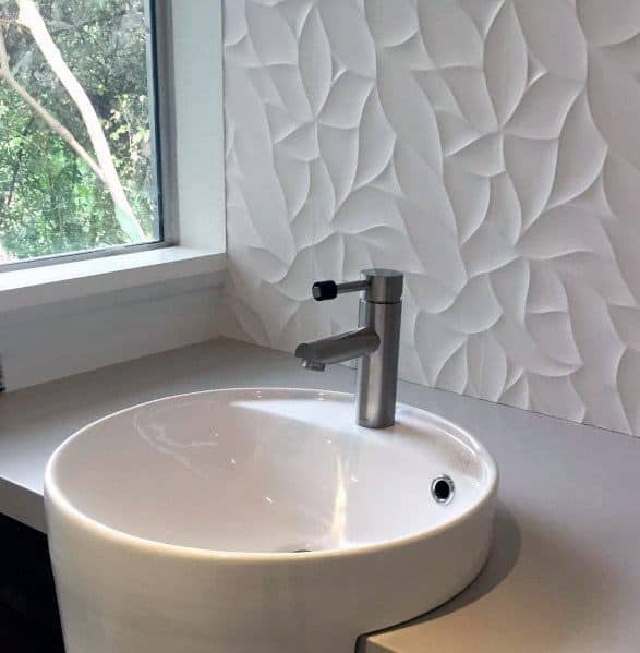 modern white sink textured white wall 