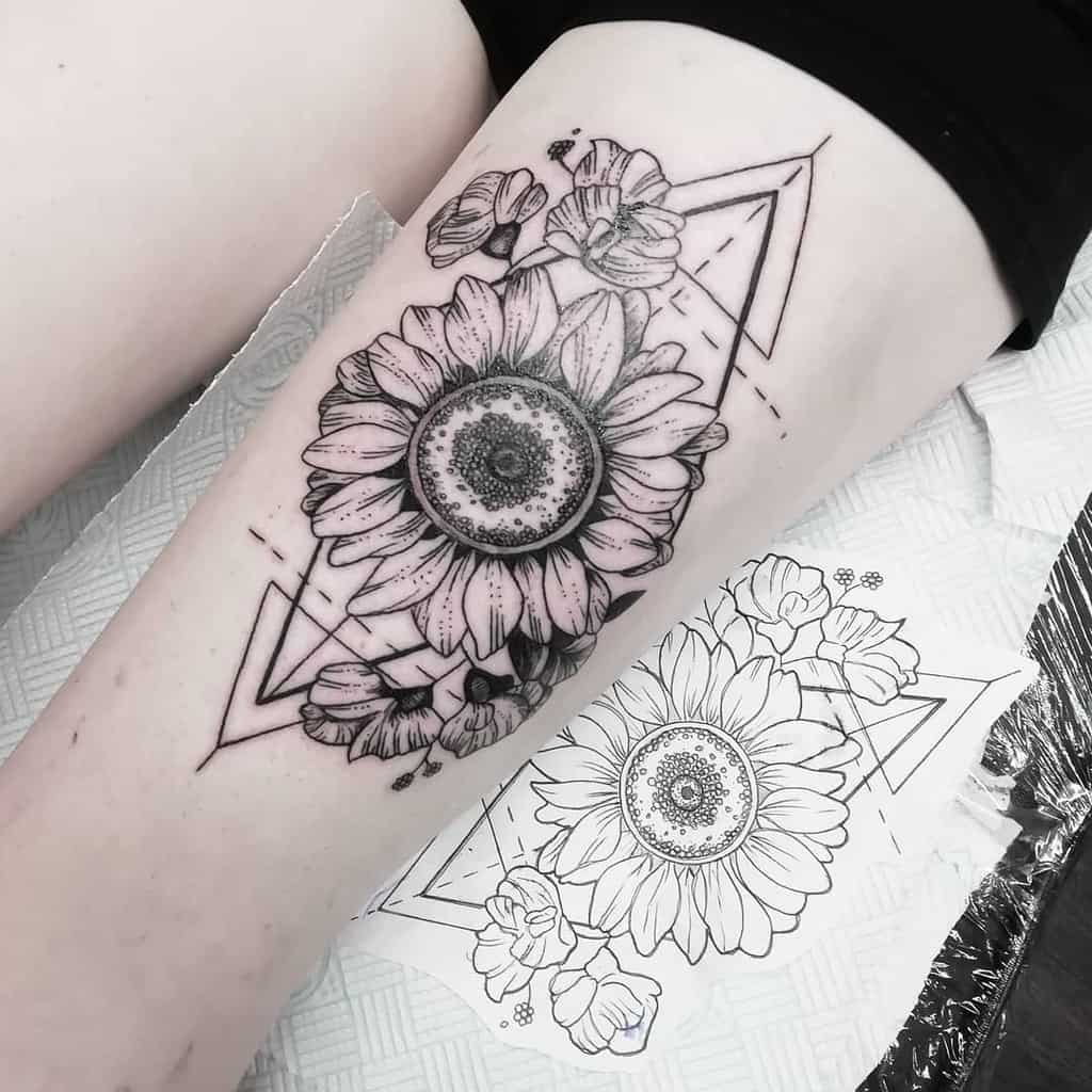 thigh geometric flower tattoo caryshamptontattoo