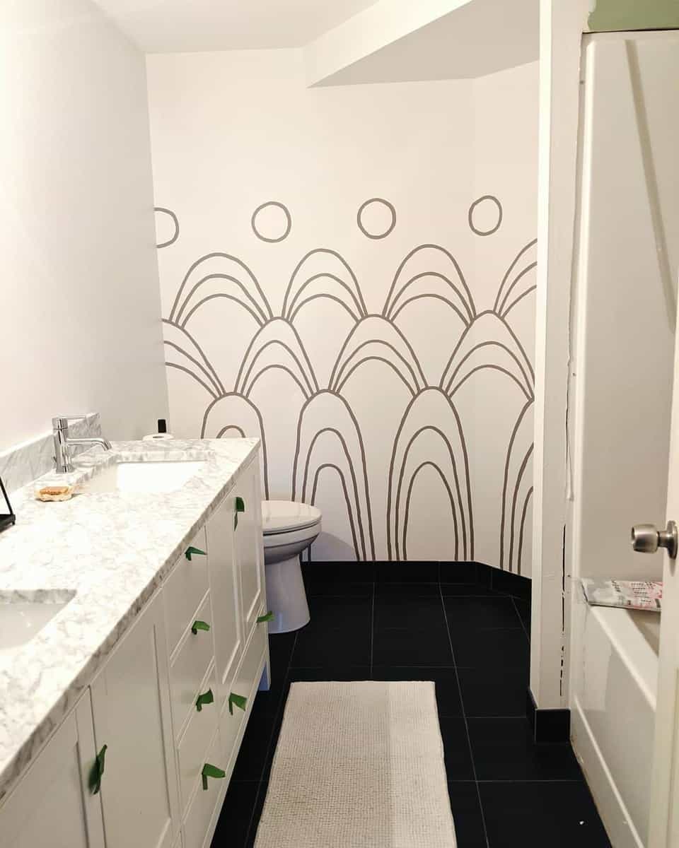 modern white bathroom with patterns on wall
