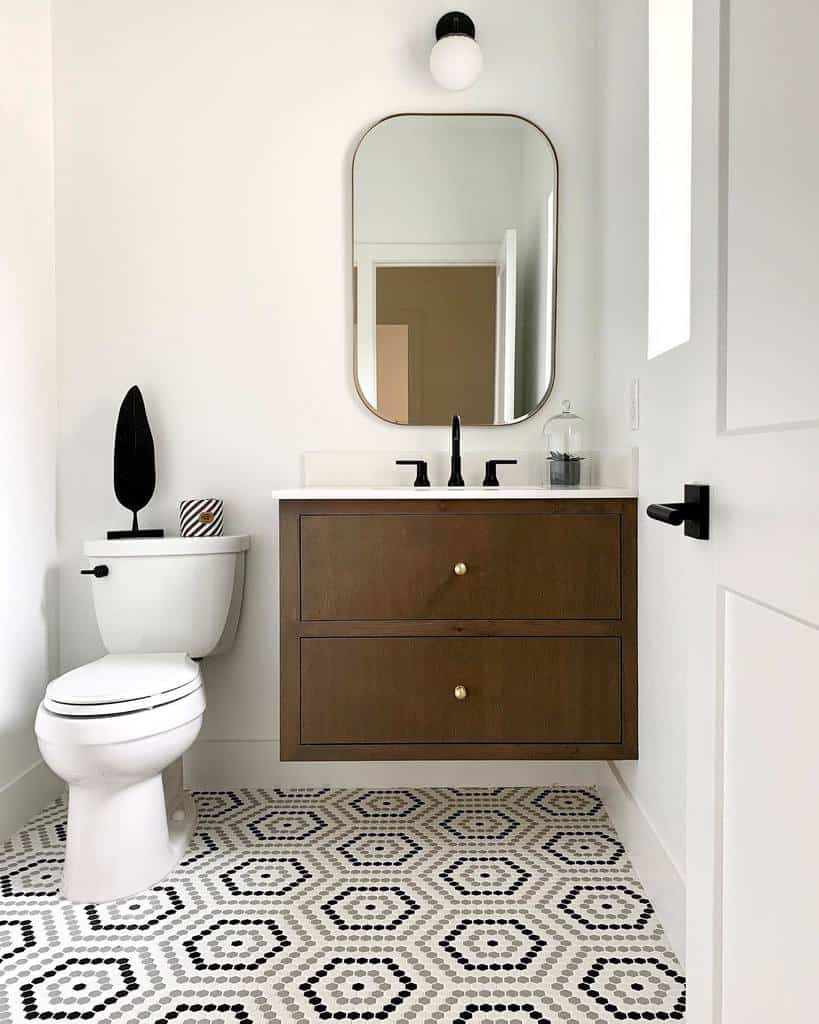 simple powder room hexagonal mosaic floor tiles wood cabinet vanity wall mirror