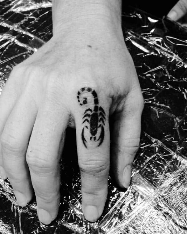 Tiny Mens Scorpio Finger Tattoo