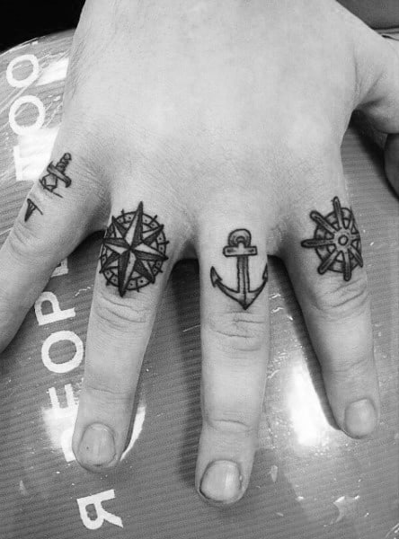 Tiny Nautical Star Finger Tattoos For Men