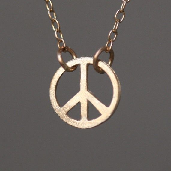 tiny round peace sign necklace in 14k gold