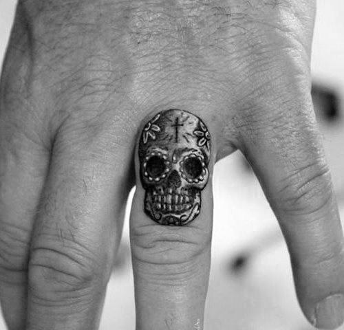 Tiny Small Day Of The Dead Finger Skull Tattoo For Guys