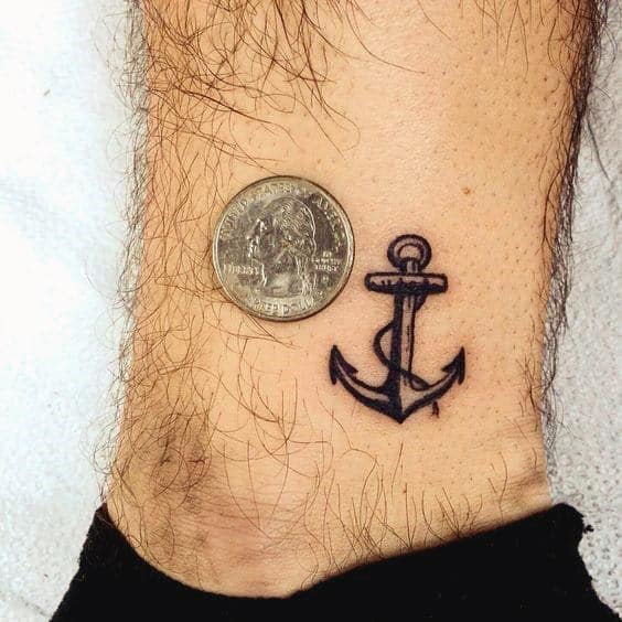 tiny small mens lower leg black ink anchor tattoo