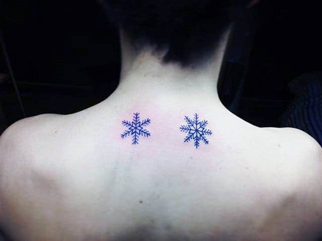 Tiny Snowflake Mens Back Tattoos