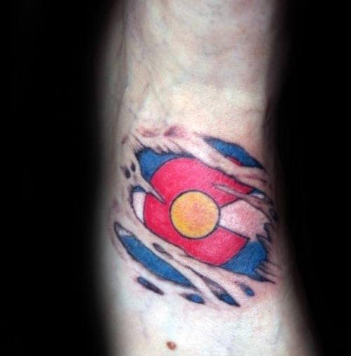 Torn Skin Colorado Foot Tattoos For Men With Flag Design