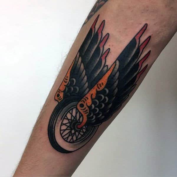 Traditional Angel Wings With Wheel Male Biker Tattoo On Forearm