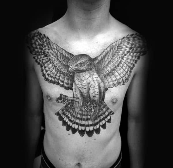 Traditional Black Ink Guys Falcon Chest Tattoo Inspiration