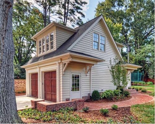 detached garage with landscaped surround