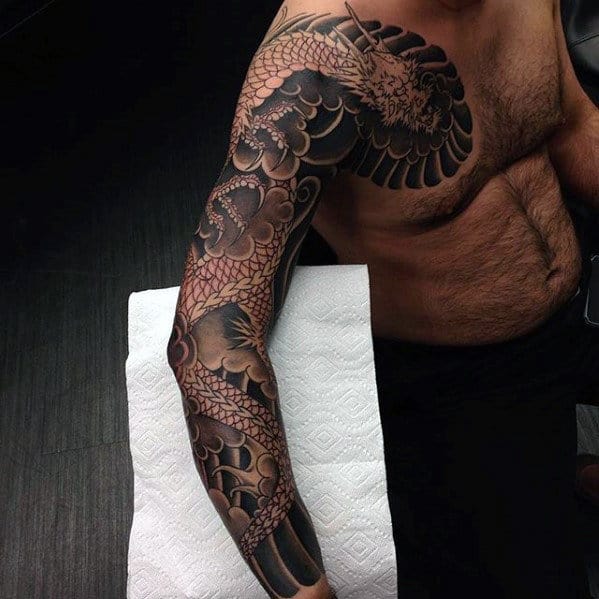 Traditional Japanese Black Ink Mens Arm And Chest Dragon Tattoos