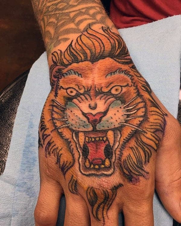 traditional-lion-male-hand-tattoos