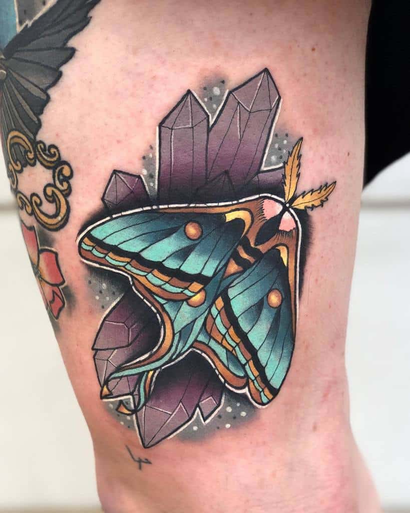 What are the different meanings of moth tattoos?