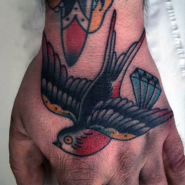 Top 73 Traditional Swallow Tattoo Ideas 2021 Inspiration Guide - Traditional Swallow Tattoo Hand