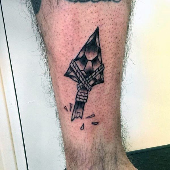 Traditional Mens Tattoo Small Arrowhead Design On Lower Leg