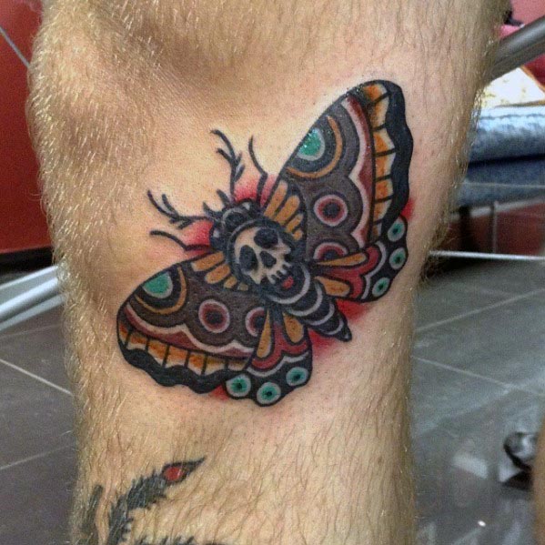 Traditional Moth Tattoo On Guys Leg