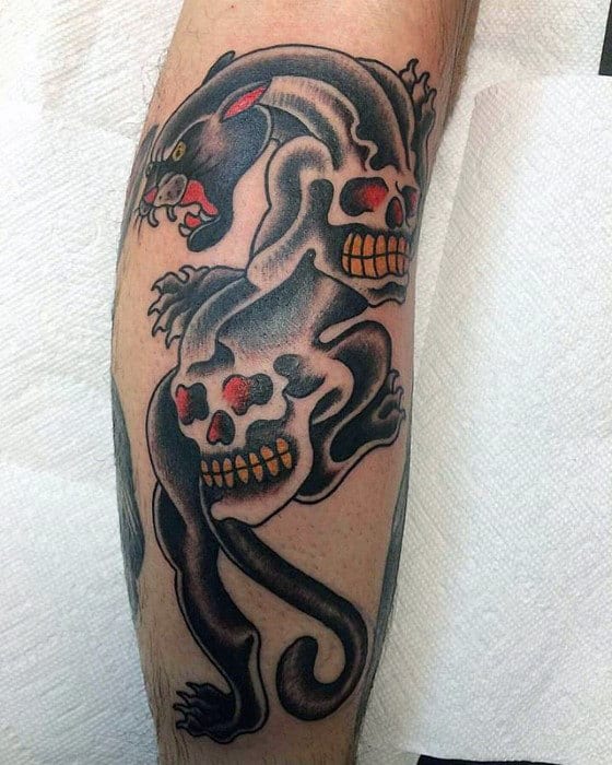 Traditional Panther With Skulls Mens Leg Tattoo