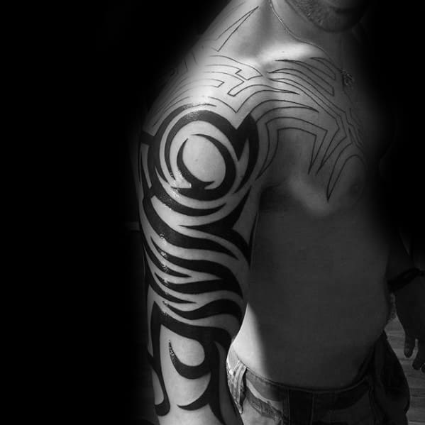 Traditional Sick Tribal Full Arm And Chest Tattoos For Men