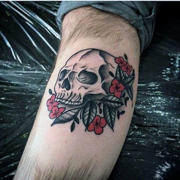 traditional-skull-with-flowers-mens-old-school-leg-tattoos