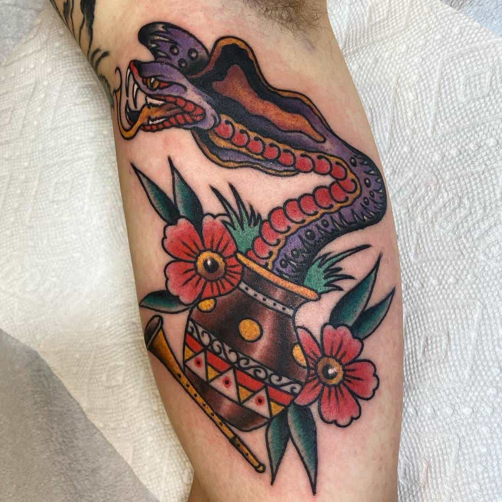 traditional snake arm tattoo kinglentattoos