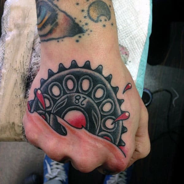 Traditional Sprocket Mens Hand Tattoos.