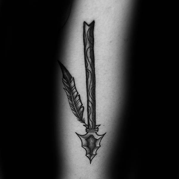 Traditional Tattoo Of Spear On Man