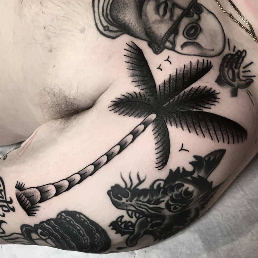 traditional upper arm tattoos for men machetattoo