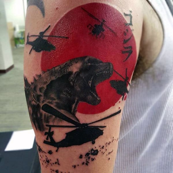 Trash Polka Watercolor Tattoo Of Godzilla Fighting Helicopters On Man