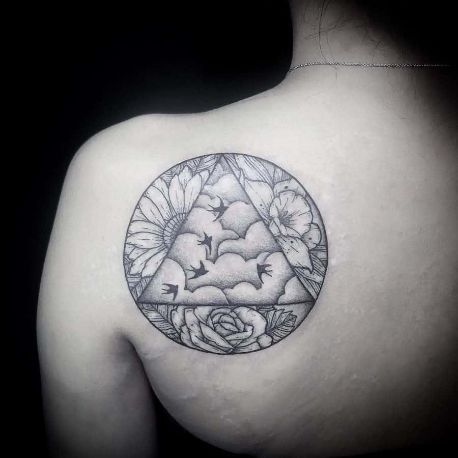 Triangle Of Bird And Clouds Inside Circle Of Flowers Abstract Daffodil Tattoo