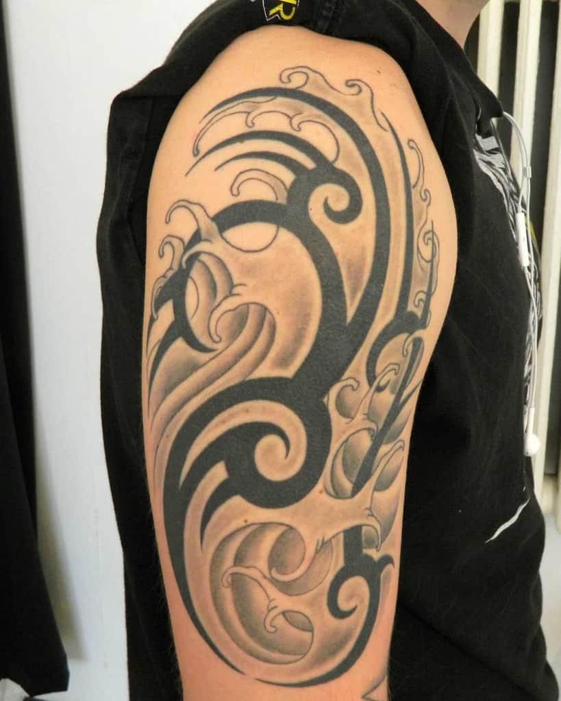 tribal black arm tattoo eterneltattoogeneva
