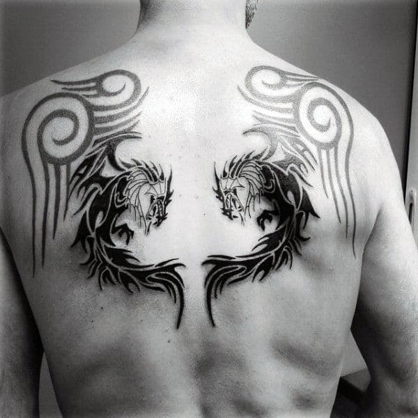 Tribal Dragon Tattoo Design On Males Back