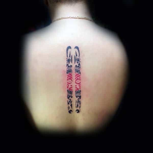 Tribal Male Skiis Spine Tattoos