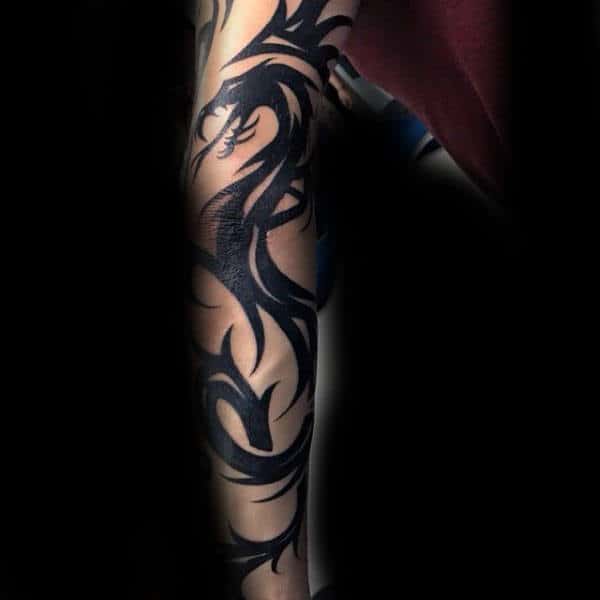 Tribal Tattoos Dragon On Men Sleeve Design