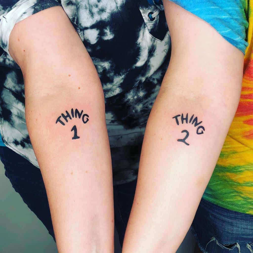 Twin art work sister tattoo lettering thing