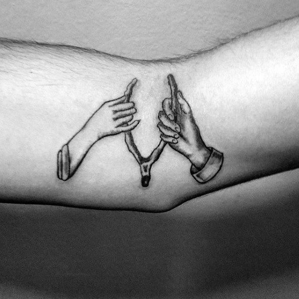 Two Hands Holding Wishbone Mens Tattoo Ideas On Inner Arm