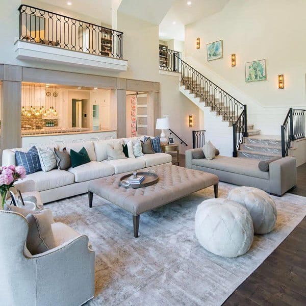 contemporary formal living room large sofa gray floor rug ottoman 