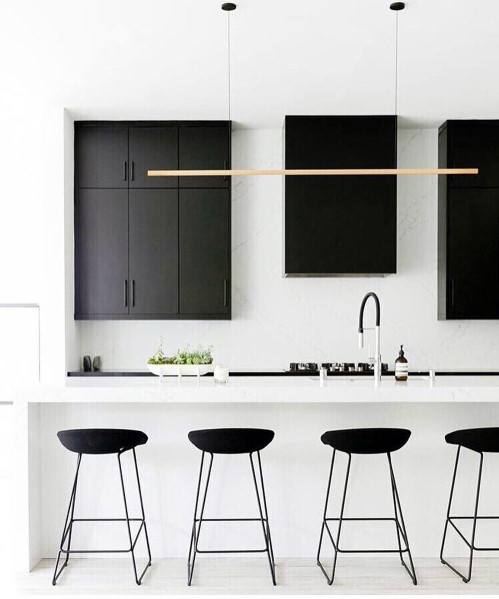 white kitchen with black accents 