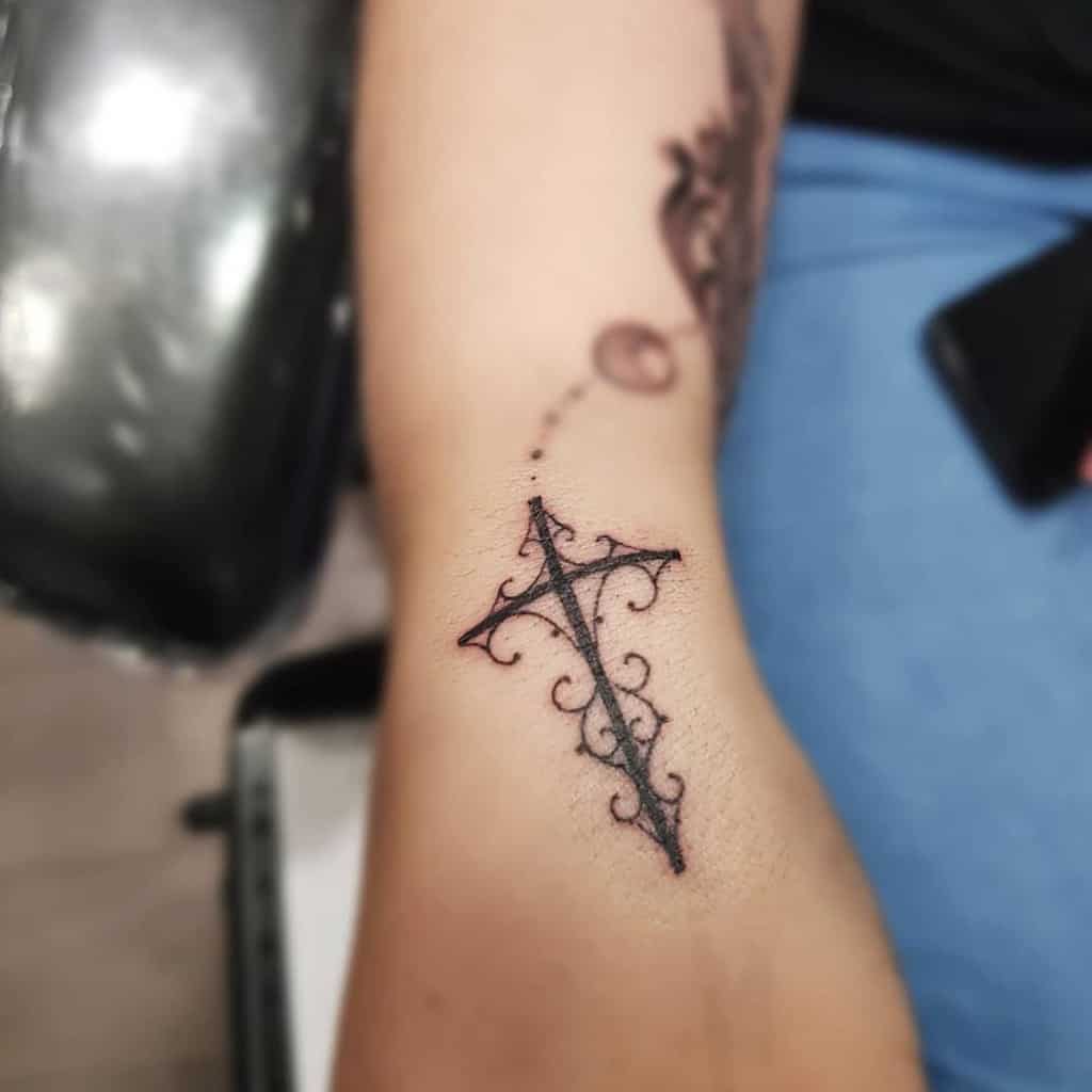 unique cross tattoos for women aerinearttattoo