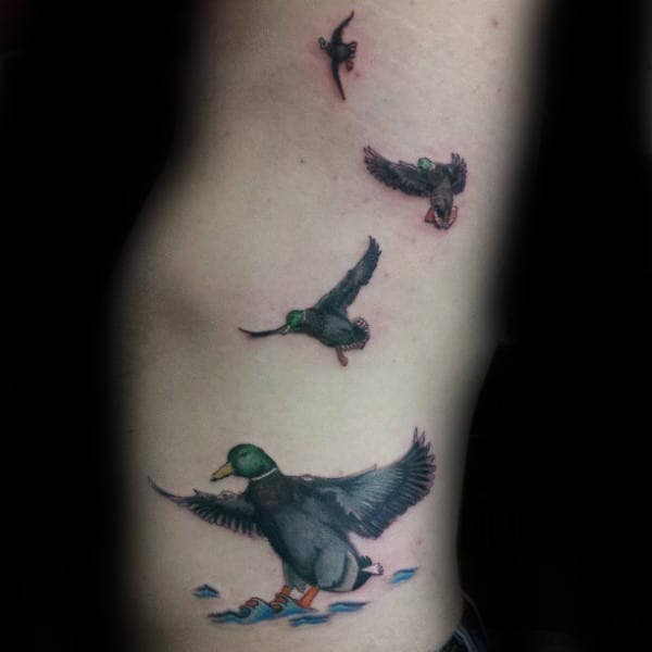 Unique Duck Flying Away Tattoo For Guy