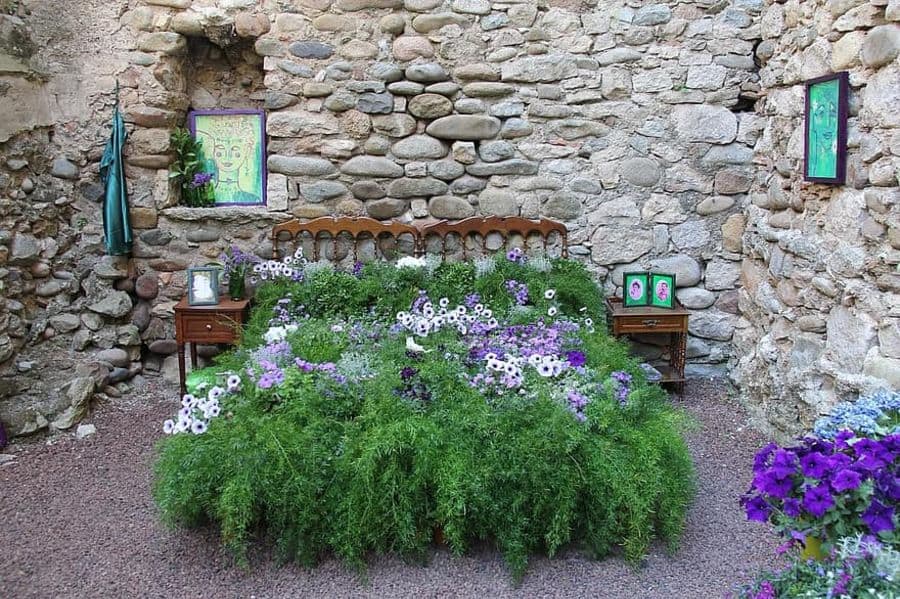 stone wall wood garden bed 