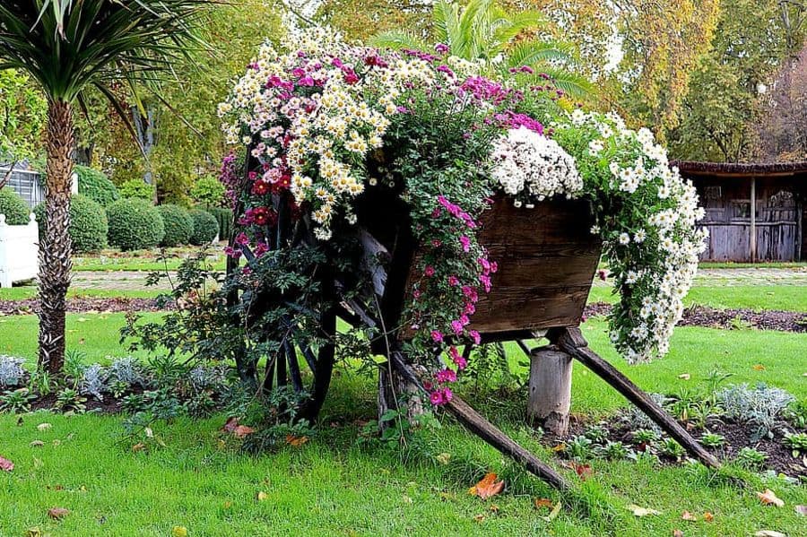 unique wood cart flower bed 