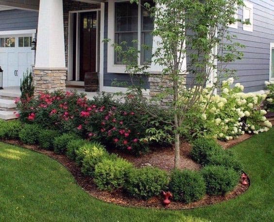 Front yard landscape design with a bay window